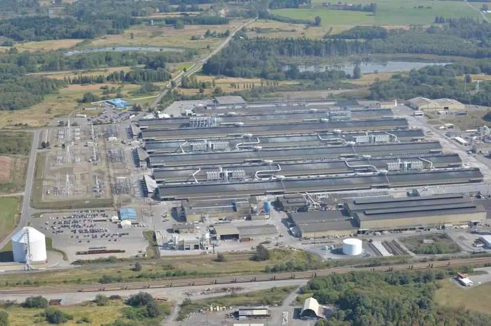 The Alcoa Intalco aluminum smelter, as seen from the air Sept. 19, 2013, will remain open at least two more years after a power deal was announced Tuesday, April 11, 2022. The Ferndale smelter had been scheduled to have its operations curtailed in June, laying off 465 workers. (Bellingham Herald photo)