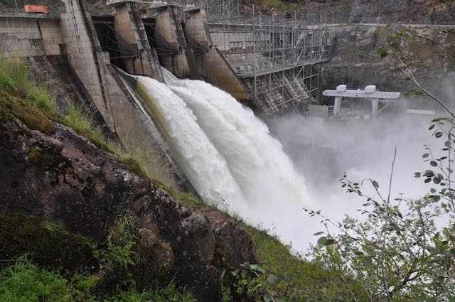 Water pours from Hells Canyon Dam on the Snake River near Idaho’s border with Oregon. (Idaho Power photo)