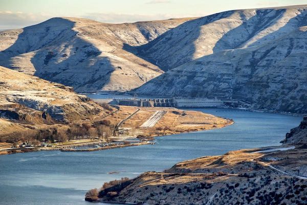 Lower Granite Dam in southeast Washington state backs up river water beyond the Idaho border some 40 miles upstream.