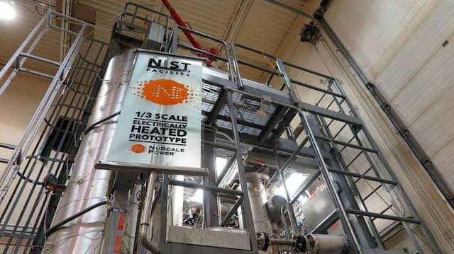 A one-third-scale model of NuScale Power's 50-megawatt reactor is perched in a birdcage of steel girders in a nuclear test facility at Oregon State University. Keith Schneider TNS