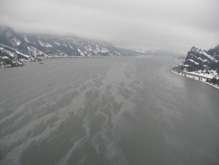 (Andy Carlson, Washington Department of Fish and Wildlife) An aerial view of oil sheens on the Columbia River following a 2004 oil spill at The Dalles Dam.