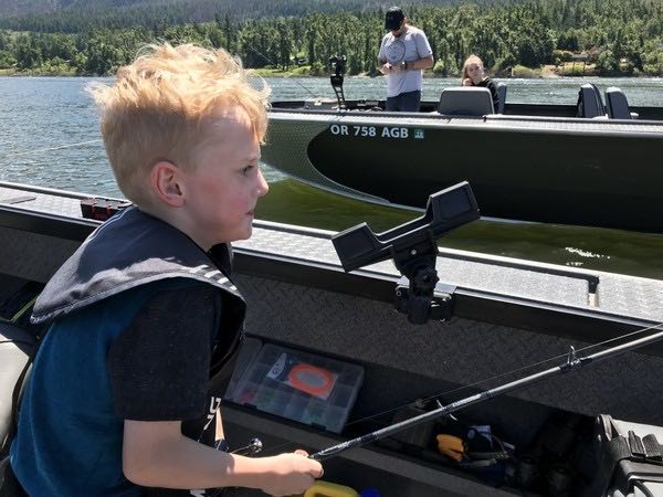Billy Monroe of Gresham celebrates his seventh birthday by landing one of five dozen shad taken recently below Bonneville Dam. (Bill Monroe)