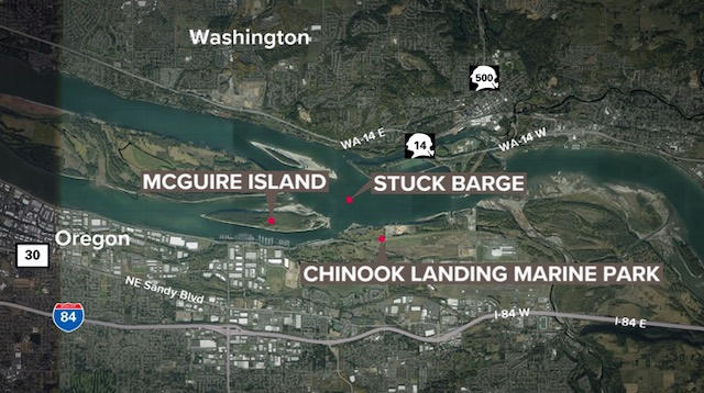 A grain barge from marine shipping company Tidewater got stuck in the sand off of McGuire Island in the Columbia River on Thursday morning.