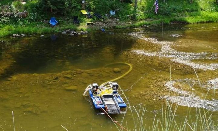 This Aug. 1, 2018, photo, submitted by the Idaho Conservation League to the U.S. District Court in Idaho, shows a suction dredging device used by Shannon Poe on the South Fork of the Clearwater River, the conservation group says. (Idaho Conservation League)