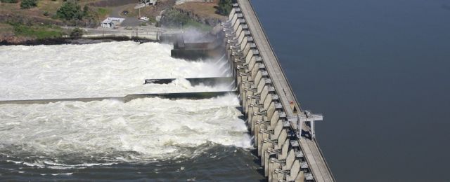 The Dalles Dam along the Columbia River, in Dalles, Ore. Five wind power companies asked federal regulators June 13 to stop the region's main transmission utility from shutting them down at night.