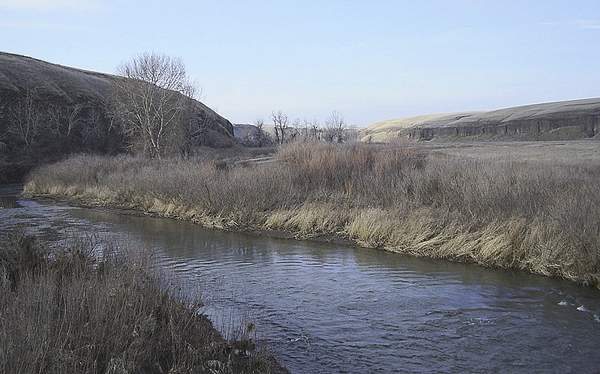 The 55-mile Touchet River, a tributary of the Walla Walla River, flows through southeast Washington. The state Department of Ecology has fined a Columbia County orchard, charging the orchard with illegally drawing from the river after DOE shut-off irrigators last summer because of the drought.