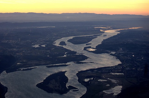 (Troy Wayrynen) The Columbia River stretches toward the west and the Pacific Ocean in this view from above Camas and Washougal.