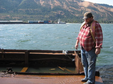 David Harris says he slept many nights on Barge 202, bailing water to keep the ship afloat.