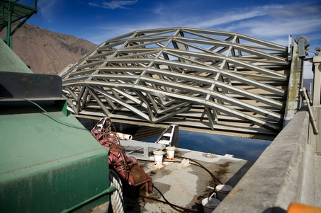 (Ross William Hamilton) Structural members of a lock gate at John Day Dam, seen Friday afternoon, are bent by the nose end of an empty grain barge pushed by Tidewater Barge Lines of Vancouver. The gate suffered extensive damage.