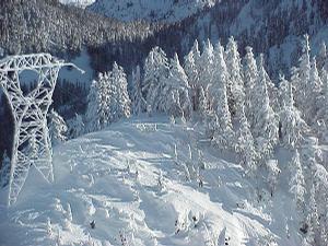 A Bonneville Power Administration transmission tower over Steven's Pass. (Bonneville Power Administration photo)
