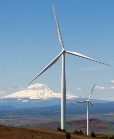 (AP photo) Wind turbines on the Columbia Gorge near Goldendale, Washington)
The federal agency that regulates much of the electrical transmission in the Northwest proposed a compromise Tuesday in a dispute with wind producers who were forced to shut down last spring, when heavy runoff produced too much hydroelectric power.
<p>
The Bonneville Power Administration, based in Portland, Ore., proposed to pay half the losses incurred by wind power producers that shut down when the extra hydroelectric power is too much for the grid to handle. The cost would be passed on in increased rates for major customers, such as public utilities, the aluminum industry, and federal installations.
<p>
