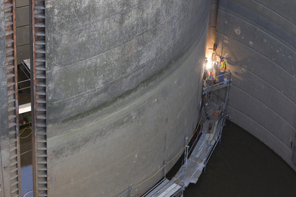 (Randy L. Rasmussen/The Oregonian) River traffic is impeded on the Columbia River at The Dalles Dam, where workers are repairing structural problems to the downriver gates of the lock