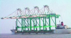 Shanghai Zhenhua Port Machinery (Group) Co. Ltd., a leading manufacturer of cranes and large steel structures, will deliver four giant, fully assembled container cranes to the Port of Tacoma today. This photo shows the ship as it leaves Shanghai Aug. 19.