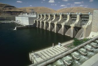 Water runs through spillway gates of Lower Monumental Dam on the Lower Snake River in southeastern Washington. Increased spills benefit salmon.