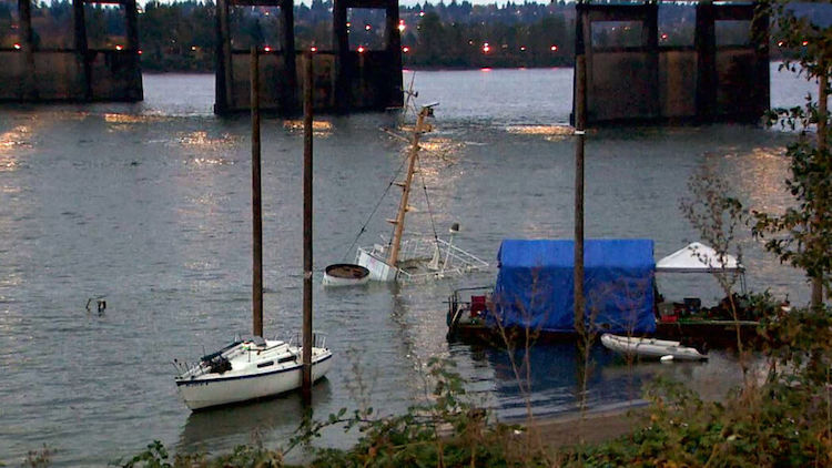 The mast of a vessel in the Columbia River near the Interstate 5 bridge was all that could be seen Monday, Nov. 1, 2021 of an abandoned boat that sank the day before. (KATU)